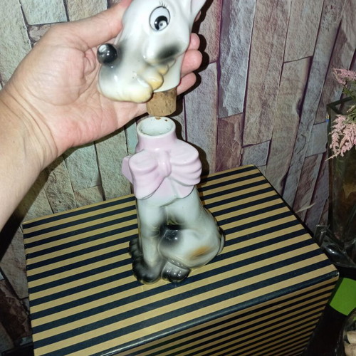 Vintage porcelain bottle shaped like a dog 26"