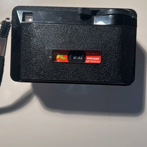 Kodak Instamatic 177X camera used, with Kodar lens and strap