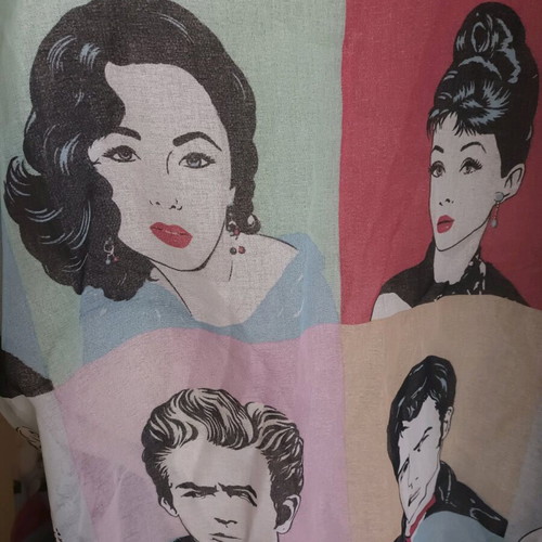 Pop art patterned curtain and orange wooden frame