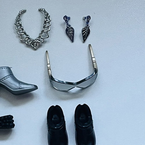 Doll accessories like new, small silver and black set