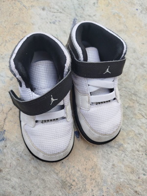 Jordan white athletic shoes size 23.5 kids