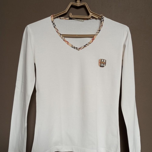 White women's long-sleeve blouse with classic checkered trim, like new