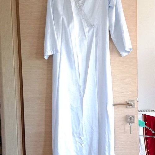 St Michael's long robe used, blue satin with lace details