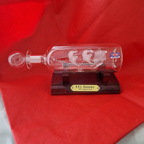Glass ship in blown glass bottle like new