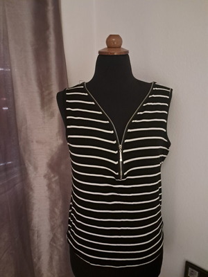 Sleeveless blouse with zipper used, black and white, fits up to large