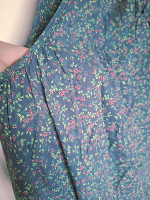 Colores strapless maxi dress with floral print and pockets