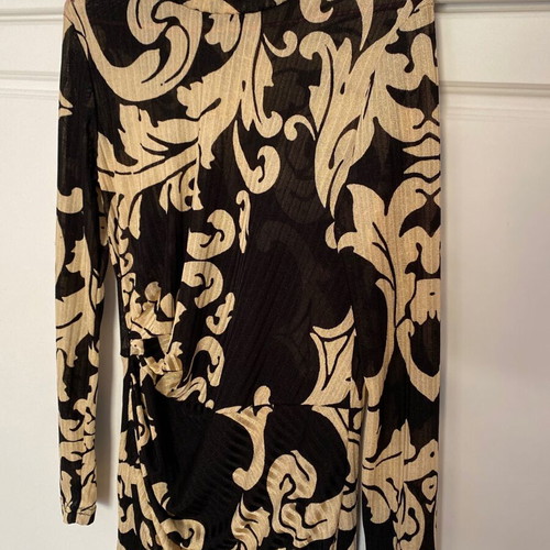Dress with patterns like new, size large but tight fit, thin fabric