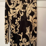 Dress with patterns like new, size large but tight fit, thin fabric