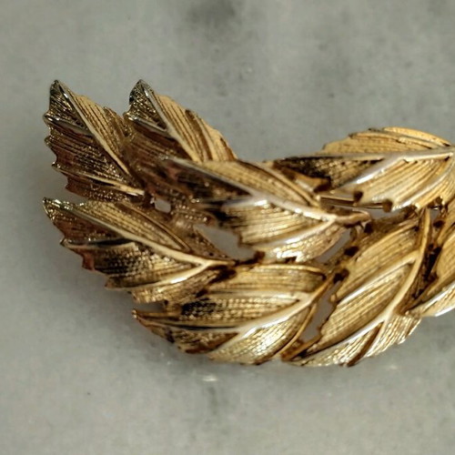 Pin used, old, gold-colored
