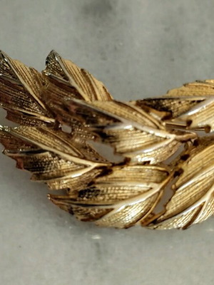 Pin used, old, gold-colored