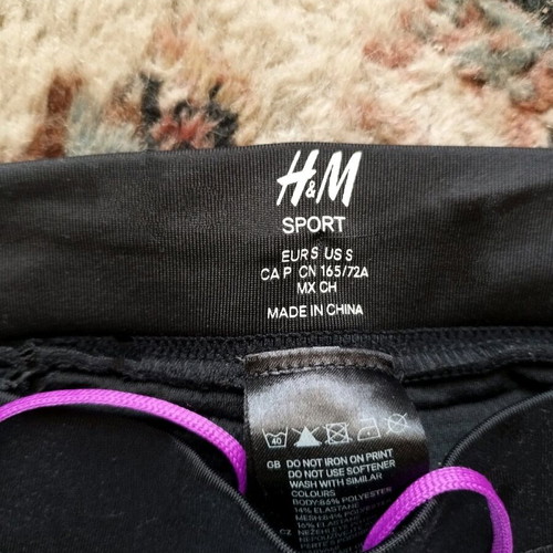 H&M sports leggings like new, black with purple details, size S