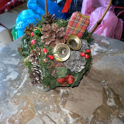 Decorated basket with pine cones new, Christmas
