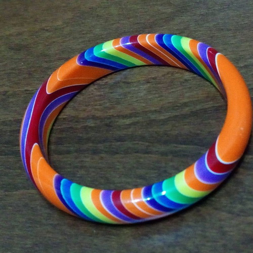 Set of 7 used neon rainbow resin bracelets 70s style