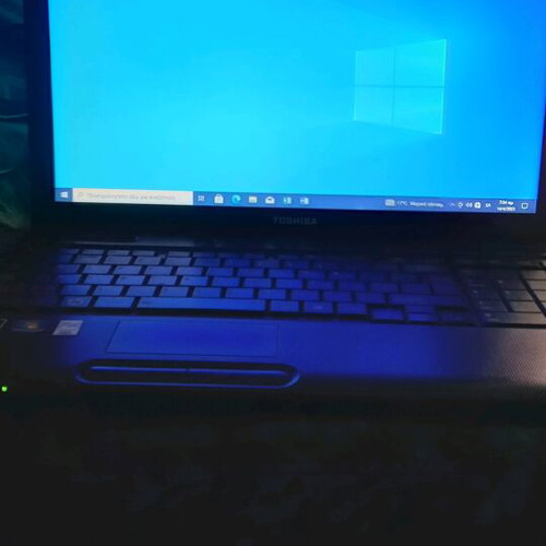 Toshiba Satellite C660D-10D laptop used with charger and accessories