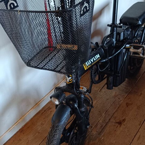 Electric bike used, 14 inches, front suspension, basket, disc brakes