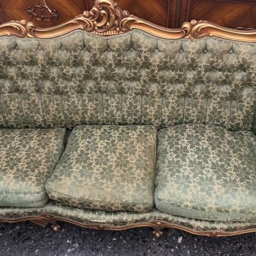 Loui vintage sofa from the 60s used with green floral fabric