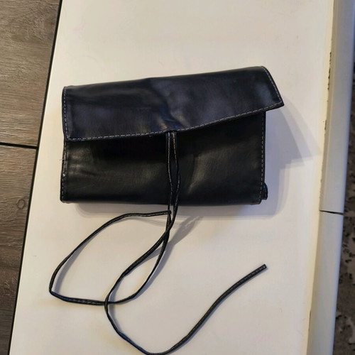 Makeup brush holder like new, black synthetic leather