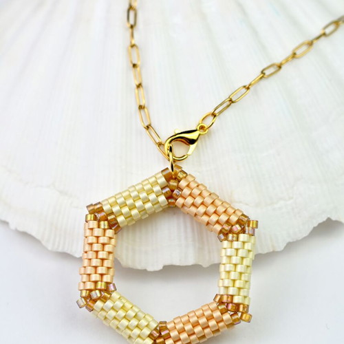 Delicate beige necklace with hexagonal pendant custom made