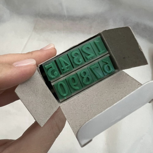 Number stamps with extra ink, new