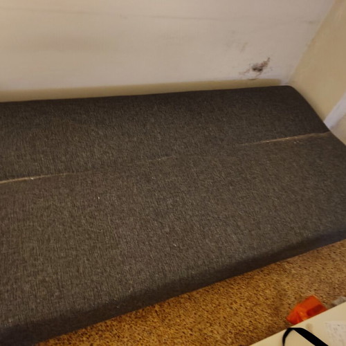Sofa bed used with storage space and small dent