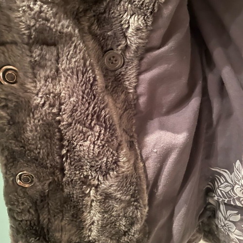 Faux fur gray small like new with design on sleeve and shoulders