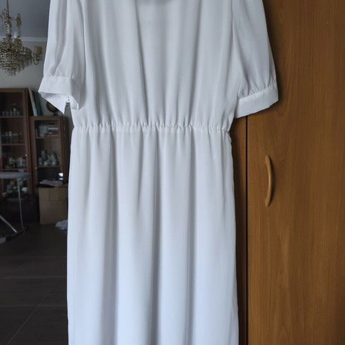Vintage white dress like new with back design