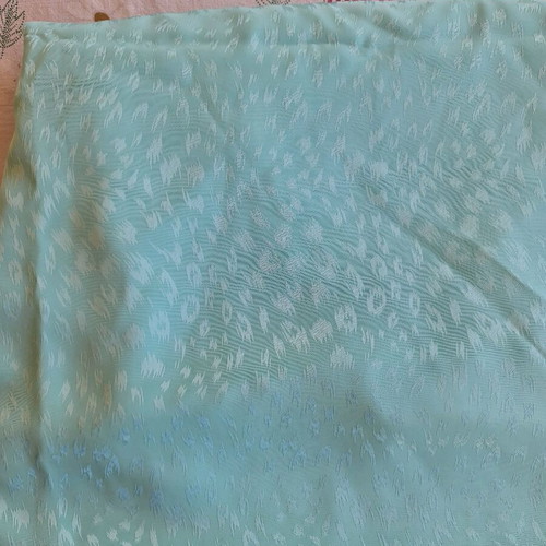 Fabric for dress in teal satin glossy