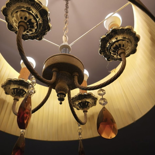Ceiling light with brass parts and yellow lampshade