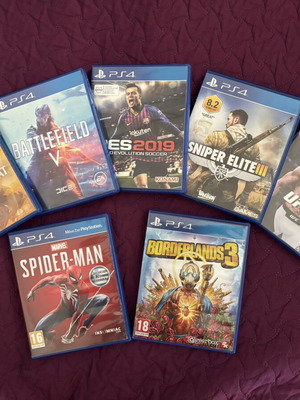 PlayStation 4 500GB console bundle with 1 controller and 7 games