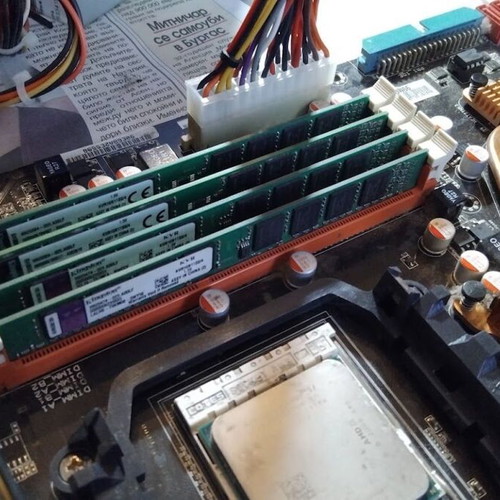 Asus M4A79T Deluxe motherboard used with CPU, fan and 16GB RAM