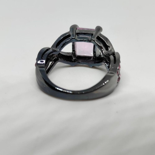 Ring with pink crystal and black base like new