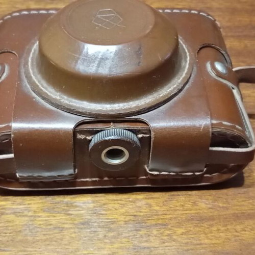 Retro Smena-4 camera used with leather case and tripod mount