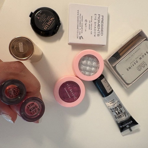 Various cosmetics like new, Colourpop liquid lipsticks and eyeshadows