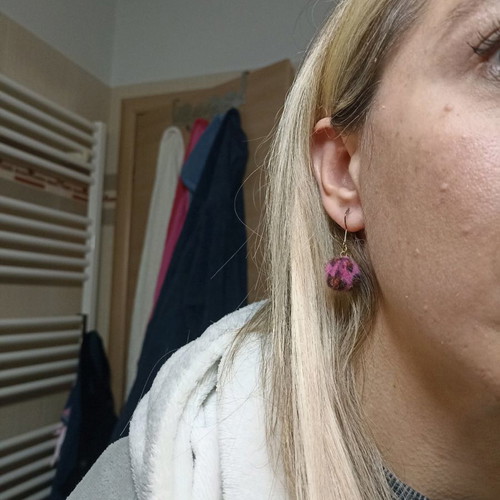 Pon pon animal print fuchsia earrings used