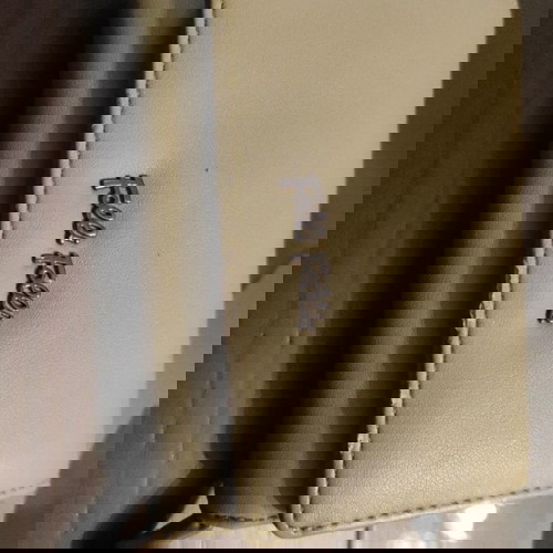 Folli Follie khaki wallet with minor wear used