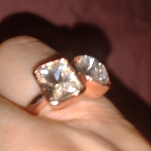 Rose gold ring with faceted rectangular and round stones