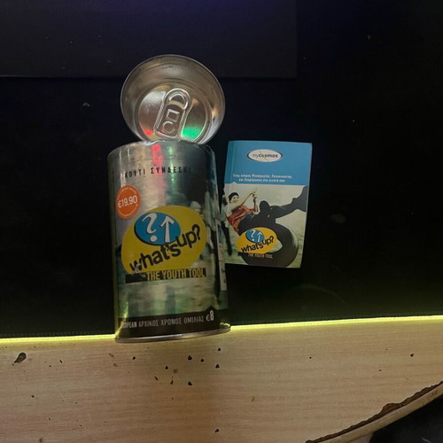 What's Up (Cosmote) collectible metal tin used with leaflet