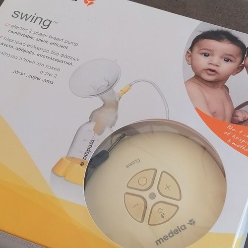 Medela Swing breast pump like new, battery and electric powered