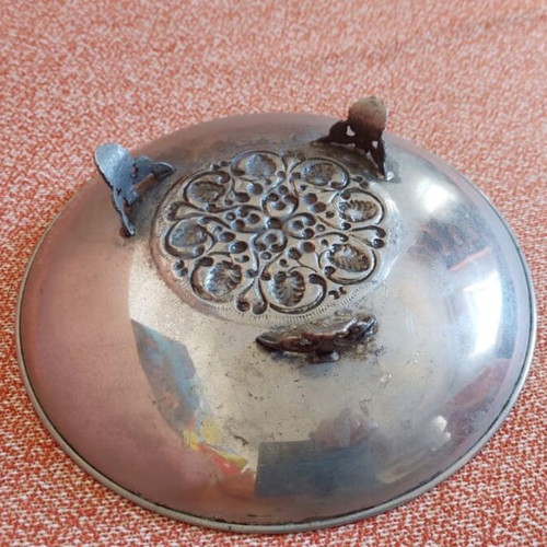 Silver-plated centerpiece bowl used with carved details and three feet