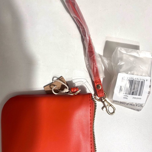 Carpisa orange handbag new with wristlet