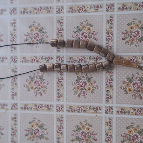 Traditional komboloi with 17 horn beads, brown shades