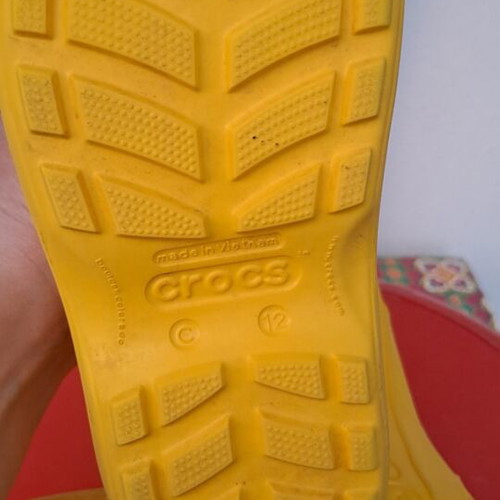 Crocs children's rain boots like new, size C 12, yellow