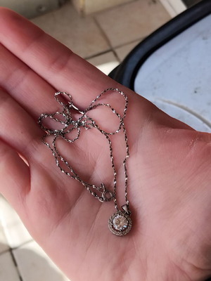 Silver necklace used with cubic zirconia