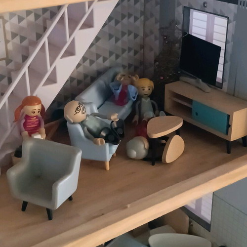 Wooden dollhouse used with extra accessories pack
