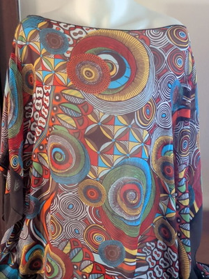 Blouse one size used, colorful geometric pattern with brown trim