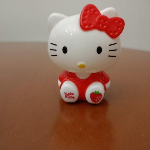 Hello Kitty figure with strawberry like new