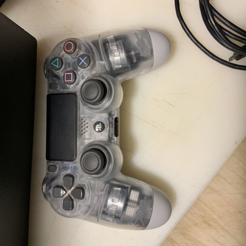 PlayStation PRO 1TB console with XRay controller, cables and Red Dead Redemption 2 game