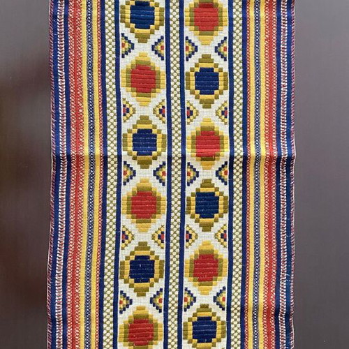 Vintage handmade embroidered runner with geometric design and fringes