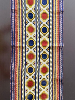 Vintage handmade embroidered runner with geometric design and fringes