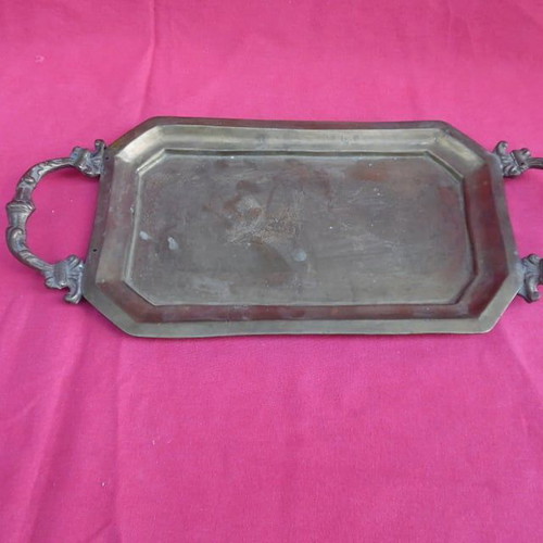 Handmade brass tray used with carved handles